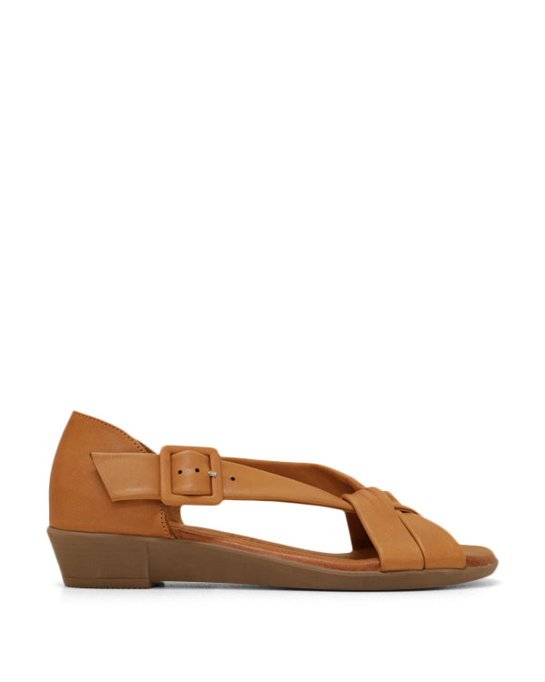 Tan leather full wrap women&#39;s sandal with buckle.