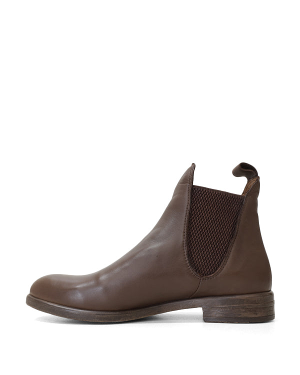 Side view of brown ankle boot with gussett