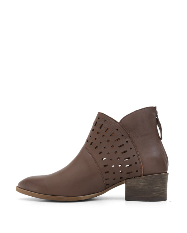 Side view brown ankle boot with laser cut detail
